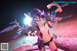 A woman with purple hair and a robot head.