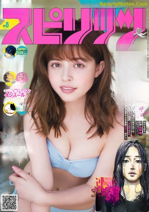 A woman in a white bikini posing for a magazine.