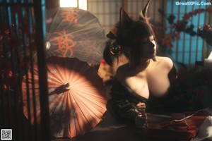 A woman in a kimono sitting on a chair holding an umbrella.
