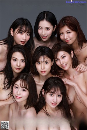 A group of naked asian women posing for a picture.